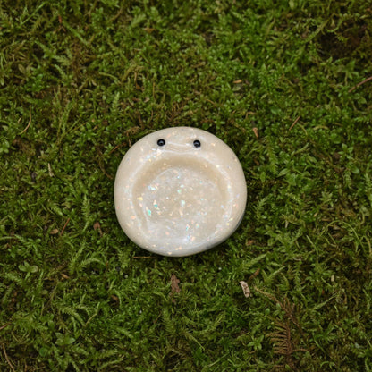 worry stone on moss
